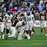 #33 Sam Ofurie and #35 Ethan Carter after stopping the Brown running back short of the first down.