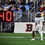 Omari Walker from McKinney Texas celebrates in the endzone with hi tying TD in the third quarter making the score 14-14..