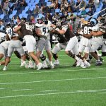 The holds happen fast, arms get hooked, shirts grabbed, and even bear hugs around the middle.  Yet no flag on this play!  URI had 7 fouls for 62 yards, including two personal fouls that took place after the play was over, while Brown had 4 fouls for 21 yards.