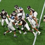 Case Mankins wraps up the Brown QB after fighting through the OL