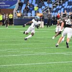 Aboraa Kwarteng racing to bring the ball up field late in the 4th qtr.  He had 2 receptions for 30 yards.