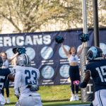 Rohan Davy (Lightning) scoop up the ball and never hesitated to go for the endzone.  Followed by URI's DJ Cureton - not taking any chances they both race toward pay dirt.