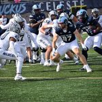 Antwain Littleton Jr, the ball carrier, follows his tight end, number 87 Will Dixon from Hillsborough NJ (West Virginia).