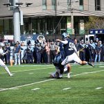 And Garth with another PAT.  Late in the game, he had a bone crunching tackle on a kickoff return - the receiver had already crossed the 40 yard line when Garth laid down the lumber!  The place holder is punter #46 James Allen.