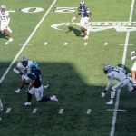 Littleton breaks free...as the 4th qtr wore on, the players start to tired out.  But the OL loves it when they have a strong RB like Antwain.