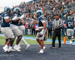 The OL completes the celebration in the endzone.
