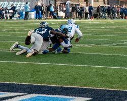 Moses Meus and Mitchell Garner with the QB takedown.