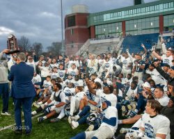 Coach Flemming raises the prize for all to see